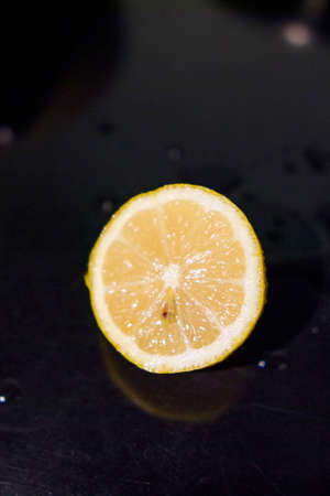 Lemons with water droplets on the surfaceの写真素材