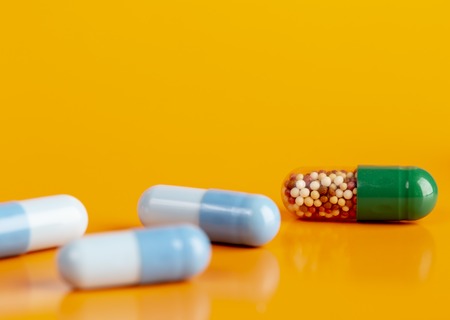 Blue and green medicine capsulesの写真素材