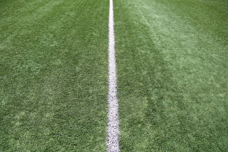 Markings on the lawn of an empty football soccer fieldの写真素材