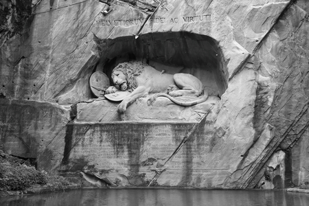 LUCERNE, SWITZERLAND - JUNE 1, 2016: Dying Lion. The world famous sculpture composition in the rockのeditorial素材