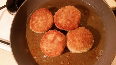 Juicy appetizing cutlets from a mixed different types of meat