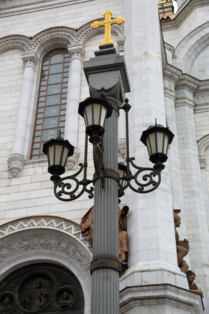 Vintage black lantern on a city streetの写真素材