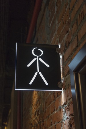 Black and white icon indicating the direction to the toiletの写真素材