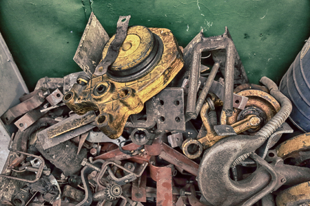 Unnecessary industrial iron and steel parts heapedの写真素材