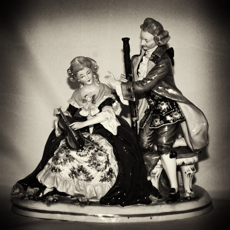 Miniature antique figurine from porcelain of the early 20th centuryの写真素材