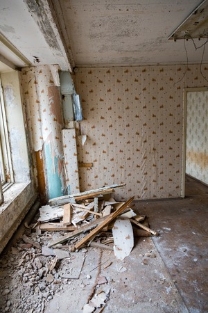 Ruined abandoned room in a house requiring major repairsの写真素材