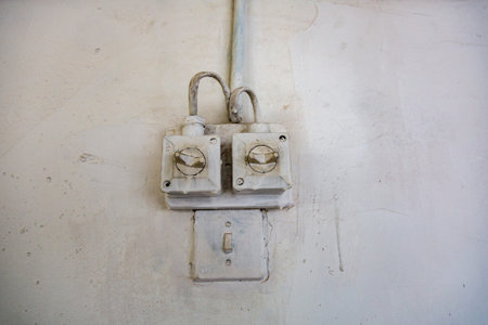 Old open broken panel for electricity distribution