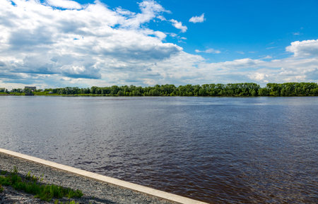 The shore of the grandiose Russian Volga river near the town of Uglich on a summer day. Yaroslavl...
