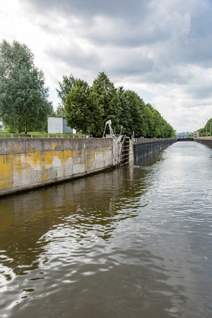 Gateway on the river to adjust the water level in the riverbedの写真素材