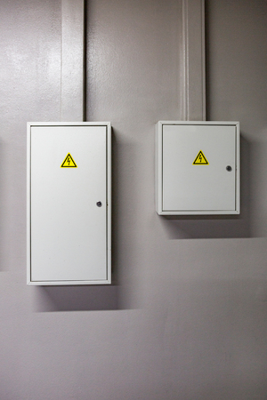 The triangular yellow sign of the danger of electric shockの写真素材