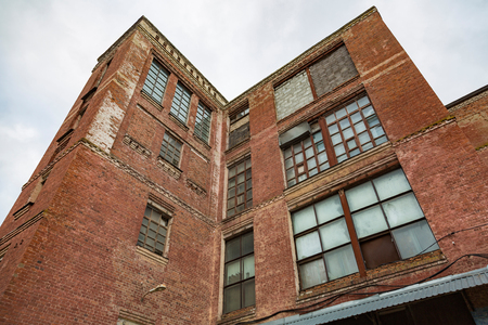 Abandoned and forsaken industrial building of the early 20th centuryの写真素材