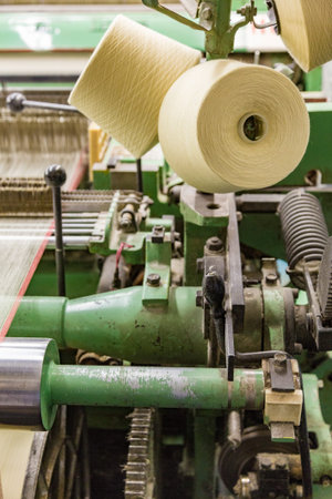 Part of the obsolete green loom at the weaving factory
