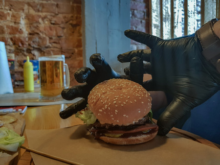 Appetizing burger with beef chops, salad and a slices of cheeseの写真素材