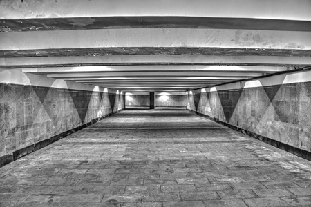 The underground passage lined with gray granite and marbleの写真素材