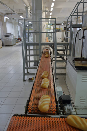 Industrial equipment and machinery at the factory of bread and sweets