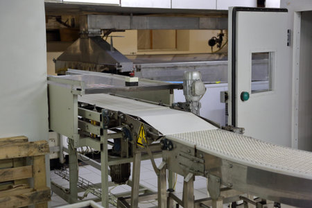 Industrial equipment and machinery at the factory of bread and sweetsの写真素材