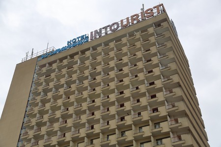 PYATIGORSK, RUSSIA - DECEMBER 25, 2018: The facade of the three-star Congress Hotel Intourist in the city center. Opened in 1987のeditorial素材