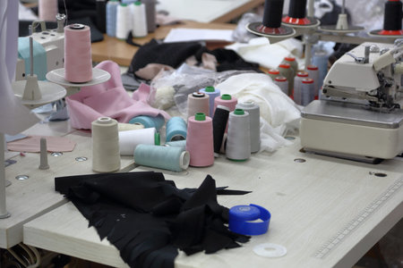 A small workshop for sewing clothes with professional equipment and tools