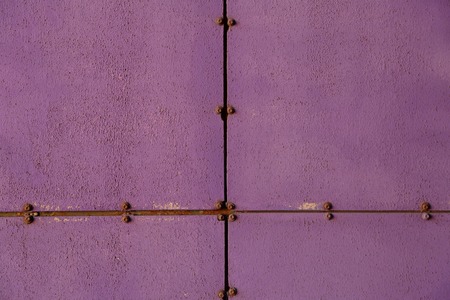 Textured surface of a bright building wallの写真素材