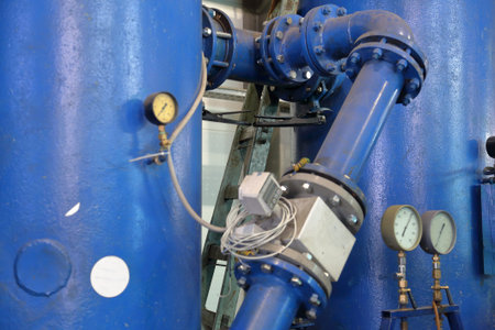 Metal parts of industrial pumping equipment in the assembly plant shop