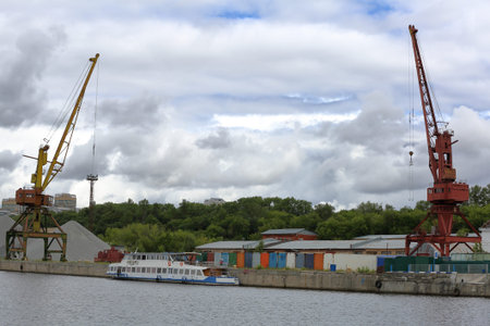 Industrial crane for unloading and loading in the river port