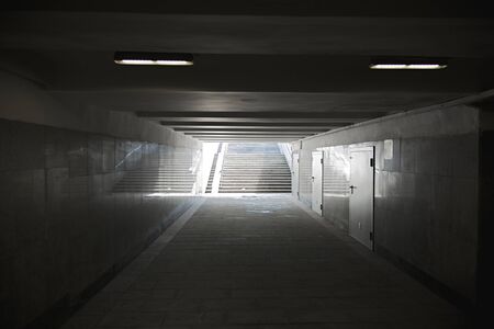 The underground passage lined with gray granite and marbleの写真素材