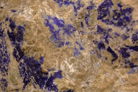 Beautiful textured surface of natural stone at the mineral exhibitionの写真素材