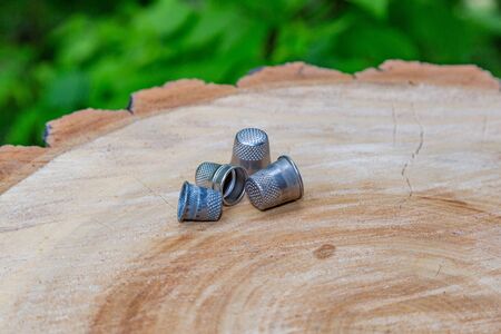 Metal vintage thimble to protect your fingers when sewingの写真素材