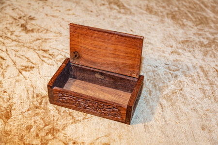 Small elegant retro casket of precious wood for storing valuables and jewelry