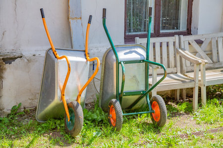 Iron trolley for manual moving of building materials in the garden and in the backyard