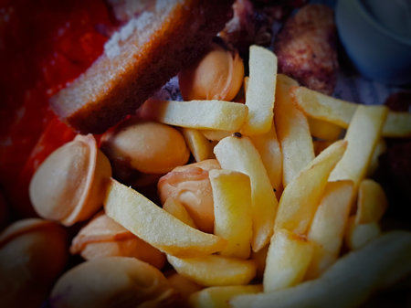 A set of delicious meat and salty vegetable snacks to accompany beer in a bar
