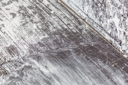 Textured surface with dirty spots and splashes of dried paint