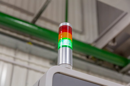 Multicolored lamp indicator of the operation of industrial equipment in a production workshop