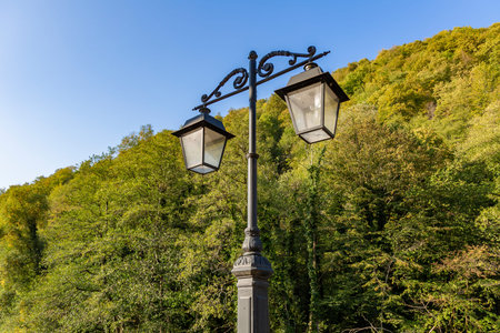 Vintage black iron lantern in a public park