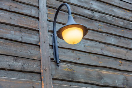 Vintage black iron lantern in a public park