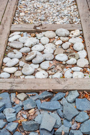 Untreated rough natural stone in everyday environment, gardening and landscapingの写真素材