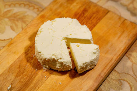Natural milk ricotta made by hand. Homemade cheese recipeの写真素材