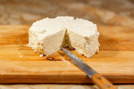 Natural milk ricotta made by hand. Homemade cheese recipeの写真素材