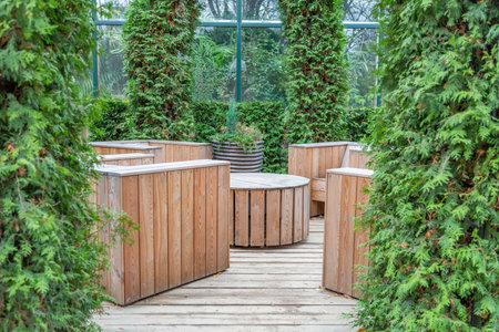 Handmade furniture made of wooden boards. Idea for landscaping the garden and backyardの写真素材