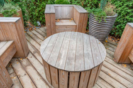 Handmade furniture made of wooden boards. Idea for landscaping the garden and backyardの写真素材