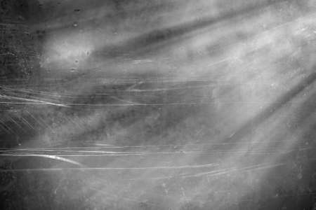 Dirty surface of cracked misted glass with dew dropsの写真素材