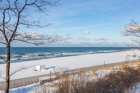 Winter seascape with Baltic Sea waters, horizon and cloudy sky in Kaliningrad region, Russiaの写真素材