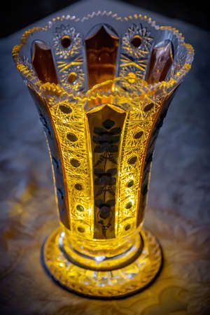 Beautiful decorative crystal vase with lighting as an element of the interiorの写真素材