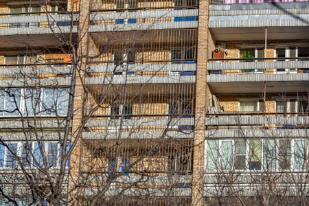 Old-fashioned brick multi-storey building. Typical Eastern European architecture of the late 20th...