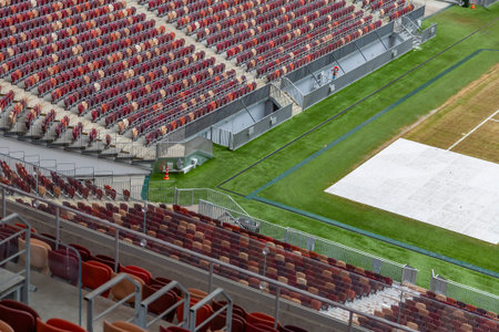 Moscow, Russia - March 14, 2021: Inside the Luzhniki soccer stadium. Rows of empty seats on the...