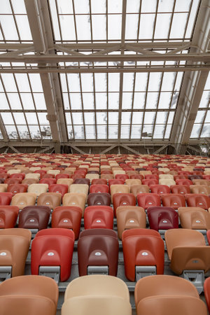 Moscow, Russia - March 14, 2021: Durable non-vandal plastic seats of the Luzhniki football stadium. Part of the tribune without peopleのeditorial素材