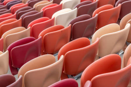 Moscow, Russia - March 14, 2021: Durable non-vandal plastic seats of the Luzhniki football stadium. Part of the tribune without peopleのeditorial素材