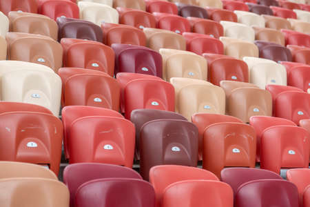 Moscow, Russia - March 14, 2021: Durable non-vandal plastic seats of the Luzhniki football stadium. Part of the tribune without peopleのeditorial素材