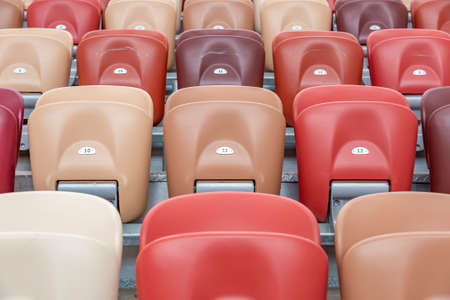 Moscow, Russia - March 14, 2021: Durable non-vandal plastic seats of the Luzhniki football stadium. Part of the tribune without peopleのeditorial素材