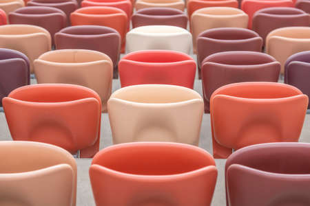 Moscow, Russia - March 14, 2021: Durable non-vandal plastic seats of the Luzhniki football stadium. Part of the tribune without peopleのeditorial素材
